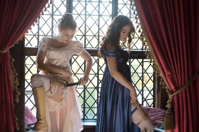 Bella Heathcote (left) and Lily James star in Screen Gems' PRIDE AND PREJUDICE AND ZOMBIES.